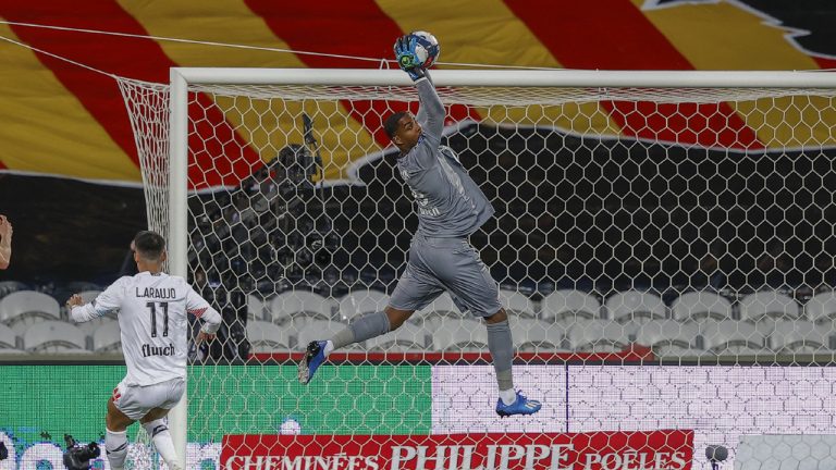 Mike MAIGNAN (G) of LILLE In action during the match between RC LENS and LILLE LOSC, Derby of the north, match of league 1 UBER EATS at Bollaert-Delelis stadium, on May 7 2021 in Lens, France. (Photo by Loic BARATOUX/ABACAPRESS.COM)