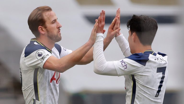 Tottenham's Harry Kane, left, celebrates after scoring his side's opening goal during the English Premier League soccer match between Tottenham Hotspur and Wolverhampton Wanderers at Tottenham Hotspur Stadium in London, England, Sunday, May 16, 2021. (Andrew Couldridge/AP, Pool)