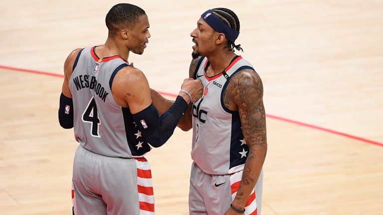 Washington Wizards guard Russell Westbrook (4) and guard Bradley Beal (3) celebrate after an NBA basketball game against the Charlotte Hornets, Sunday, May 16, 2021, in Washington. (Nick Wass/AP)