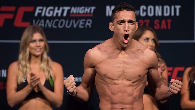 Charles Oliveira, of Brazil, poses during the weigh-in for a UFC Fight Night event. (Darryl Dyck/CP)