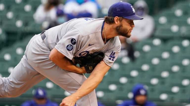 Los Angeles Dodgers starting pitcher Clayton Kershaw throws the ball against the Chicago Cubs during the first inning of the first baseball game of a doubleheader Tuesday, May, 4, 2021, in Chicago. (David Banks / AP)
