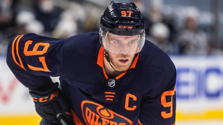 Edmonton Oilers' Connor McDavid (97) lines up for a face-off against the Winnipeg Jets during second period NHL action in Edmonton on Wednesday, February 17, 2021. (Jason Franson/CP)