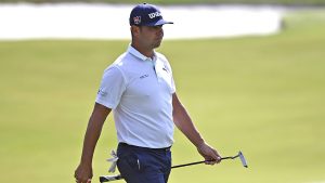 Gary Woodland walks across the 15th green to putt during the second round of the Wells Fargo Championship golf tournament at Quail Hollow Club in Charlotte, N.C., Friday, May 7, 2021.  (Jeff Siner/The Charlotte Observer via AP)