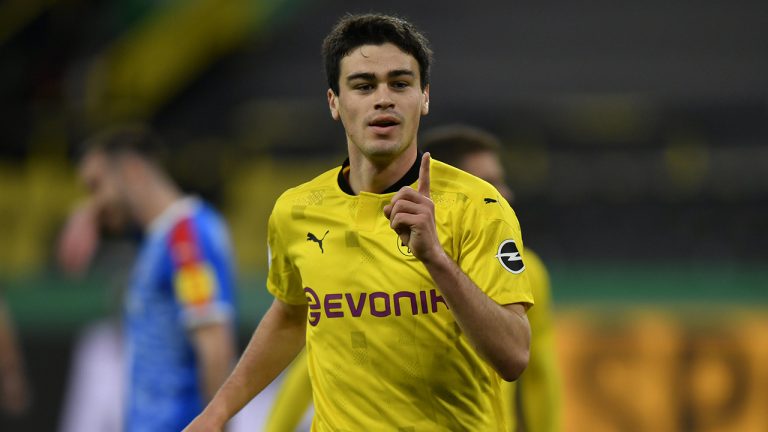 Dortmund's Giovanni Reyna celebrates after scoring his side's opening goal during the German Soccer Cup semifinal match between Borussia Dortmund and Holstein Kiel in Dortmund, Germany, Saturday, May 1, 2021. (AP Photo/Martin Meissner, Pool)