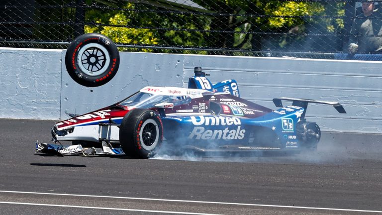 Graham Rahal hits the wall in Turn 2 after losing a tire during the Indianapolis 500 auto race at Indianapolis Motor Speedway. (Rob Baker/AP)