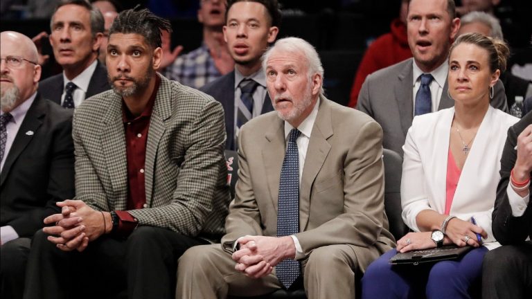San Antonio Spurs head coach Gregg Popovich, center, watches his players with assistant coaches Becky Hammon, right, and Tim Duncan, left, during the first half of an NBA basketball game against the Brooklyn Nets Friday, March 6, 2020, in New York. (Frank Franklin II/AP)