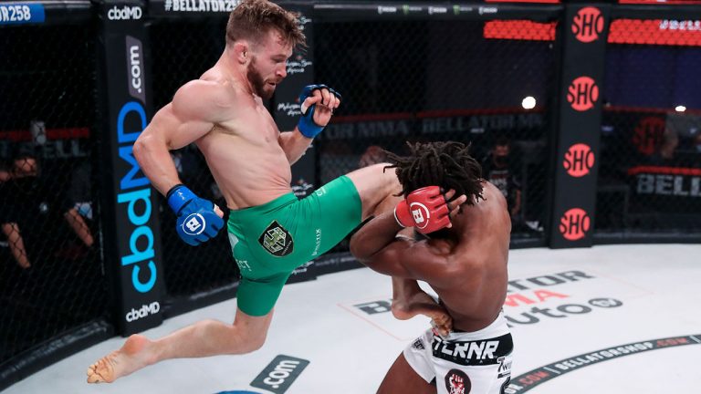 Josh Hill throws flying knee at Raufeon Stots at Bellator 258. (Bellator MMA)