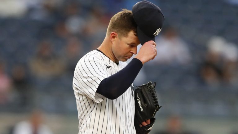 New York Yankees starting pitcher Corey Kluber (28) reacts after giving up a home run against the Toronto Blue Jays during the third inning of a baseball game Tuesday, May 25, 2021, in New York. (Noah K. Murray/AP)