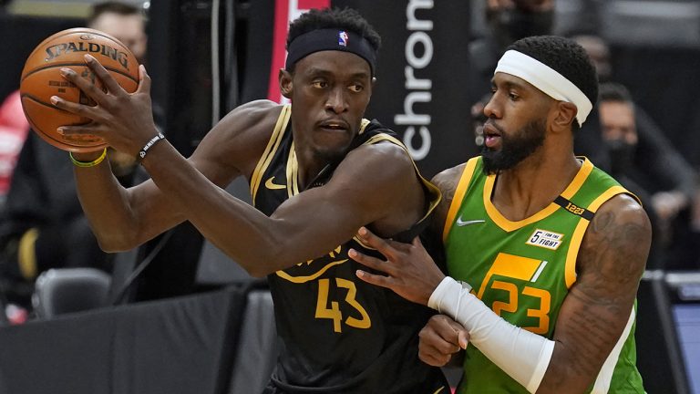 Toronto Raptors forward Pascal Siakam (43) works in against Utah Jazz forward Royce O'Neale (23) during the second half of an NBA basketball game. (Chris O'Meara/AP)