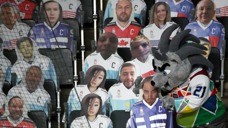 Cardboard cut-outs of fans are pictured during the 2021 IIHF World Championship Group B ice hockey match between Canada and the USA at Arena Riga. (Natalia Fedosenko/TASS)