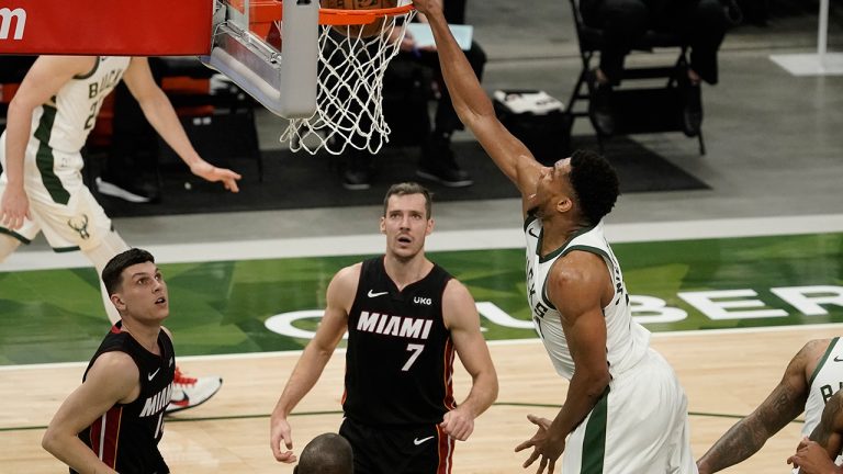 Milwaukee Bucks' Giannis Antetokounmpo dunks during the second half of an NBA basketball game against the Miami Heat Saturday, May 15, 2021, in Milwaukee. (Morry Gash/AP)