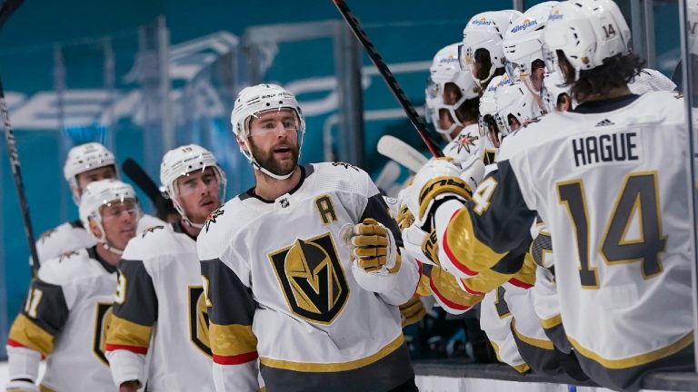 Vegas Golden Knights defenseman Alex Pietrangelo, middle, is congratulated by teammates after scoring against the San Jose Sharks during the first period of an NHL hockey game in San Jose, Calif., Wednesday, May 12, 2021. (Jeff Chiu/AP)