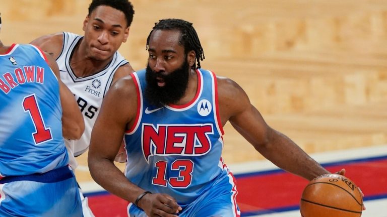 Spurs Nets Basketball
Brooklyn Nets' James Harden, right, drives past San Antonio Spurs' Devin Vassell during the second half of an NBA basketball game Wednesday, May 12, 2021, in New York. The Nets won 128-116. (Frank Franklin II/AP)