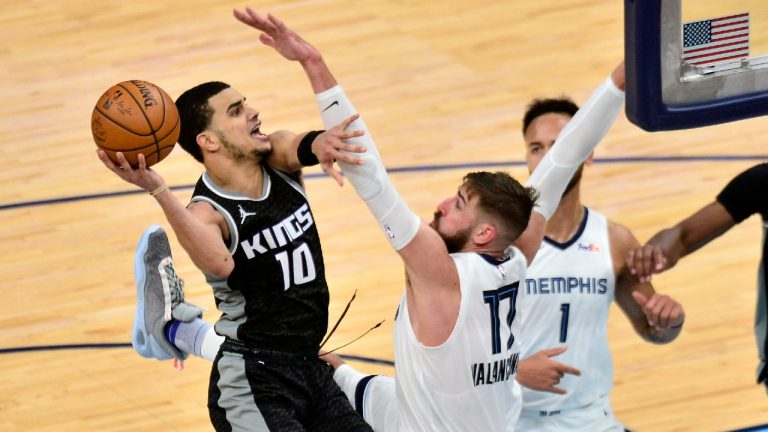Sacramento Kings guard Justin James (10) shoots against Memphis Grizzlies center Jonas Valanciunas (17) in the second half of an NBA basketball game Thursday, May 13, 2021, in Memphis, Tenn. (Brandon Dill/AP)