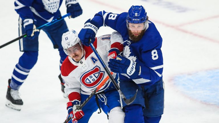 Toronto Maple Leafs defenceman Jake Muzzin and Montreal Canadiens forward Brendan Gallagher battle for the puck. (Alex D’Addese/Sportsnet)