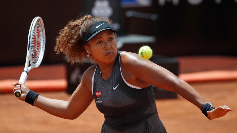 Naomi Osaka returns the ball to Jessica Pegula during their match at the Italian Open tennis tournament, in Rome, Wednesday, May 12, 2021.  (Alessandra Tarantino/AP) 