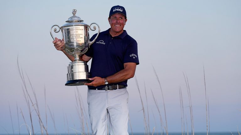 Phil Mickelson holds the Wanamaker Trophy after winning the PGA Championship golf tournament on the Ocean Course, Sunday, May 23, 2021, in Kiawah Island, S.C. (David J. Phillip/AP)