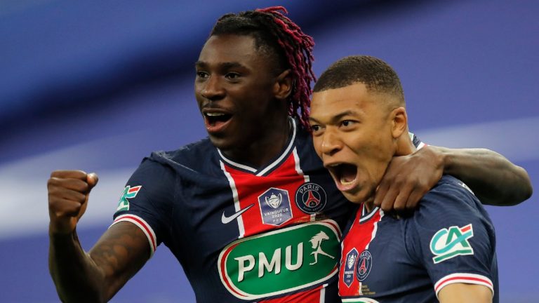 PSG's Kylian Mbappe celebrates with Moise Kean after scoring his side's second goal during the French Cup final soccer match between Paris Saint Germain and Monaco at the Stade de France stadium, in Saint Denis, north of Paris, Wednesday, May 19, 2021. (Christophe Ena/AP)