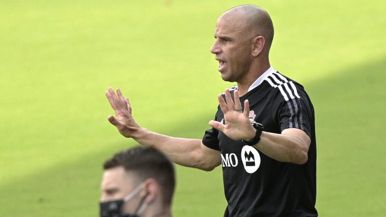 Toronto FC head coach Chris Armas, right, calls out instructions during the first half of an MLS soccer match against the Vancouver Whitecaps, Saturday, April 24, 2021, in Orlando, Fla. (Phelan M. Ebenhack/AP)