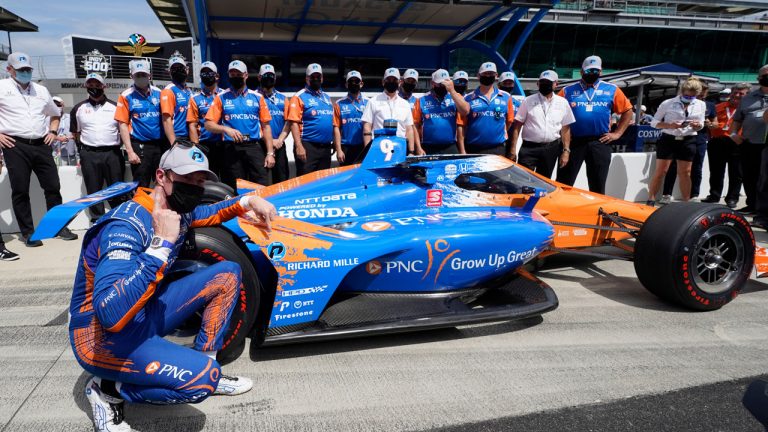 Scott Dixon, of New Zealand, celebrates after winning the pole for the Indianapolis 500 auto race at Indianapolis Motor Speedway. (Darron Cummings/AP)