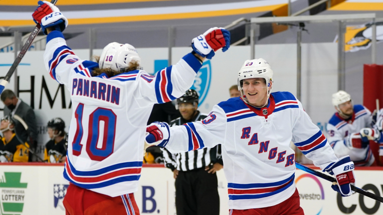 New York Rangers' Adam Fox (23) celebrates his goal during the second period of an NHL hockey game against the Pittsburgh Penguins in Pittsburgh, Friday, Jan. 22, 2021. (Gene J. Puskar / AP)