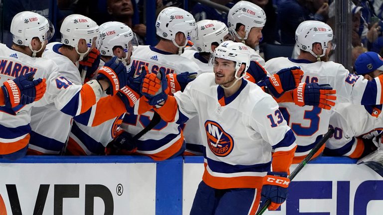 New York Islanders center Mathew Barzal (13) celebrates with the bench after scoring against the Tampa Bay Lightning during the second period in Game 1 of an NHL hockey Stanley Cup semifinal playoff series Sunday, June 13, 2021. (Chris O'Meara/AP)