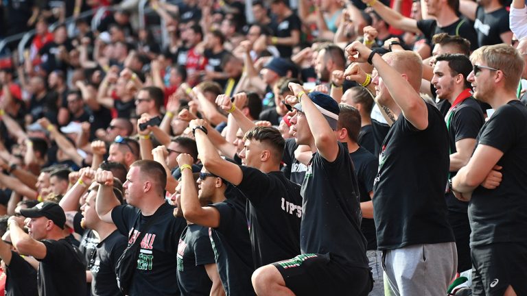 Hungary fans cheer their team before the Euro 2020 soccer championship group F soccer match between Hungary and Portugal at the Puskas Arena in Budapest, Hungary, Tuesday, June 15, 2021. (Tibor Illyes/Pool via AP) 