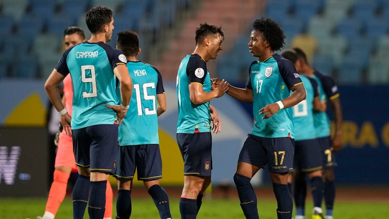 Ecuador's players greet each other at the end of a Copa America soccer match against Brazil at Olimpico stadium in Goiania, Brazil, Sunday, June 27, 2021. The match ended in a 1-1 draw, with Ecuador making it to the quarterfinals. (Ricardo Mazalan/AP)