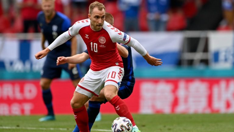 Denmark's Christian Eriksen controls the ball during the Euro 2020 soccer championship group B match between Denmark and Finland. (Stuart Franklin/Pool via AP)