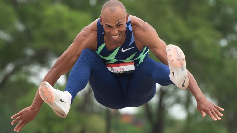 Damian Warner competes in the Men’s Long Jump final Friday, June 25, 2021 at the Canadian Track and Field Olympic trials in Montreal. Warner, who has already qualified for the Tokyo Olympics in decathlon, won the long jump which he is using as a warmup. (Ryan Remiorz / CP)