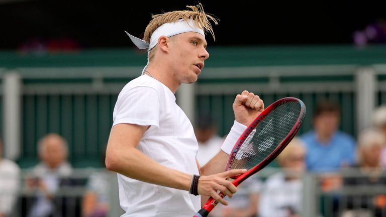Canada's Denis Shapovalov celebrates winning a point against Germany's Philipp Kohlschreiber. (Alastair Grant/AP)