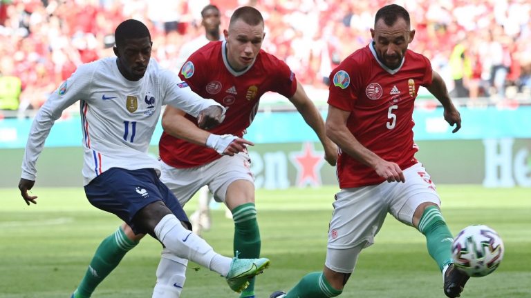 France's Ousmane Dembele, left, will miss the remainder of Euro 2020 with a knee injury. (Tibor Illyes/Pool via AP)