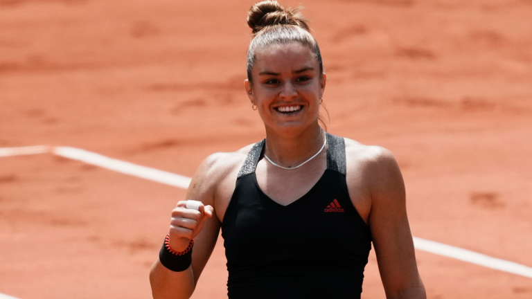 Maria Sakkari of Greece clenches her fist after defeating Poland's Iga Swiatek during their quarterfinal match of the French Open tennis tournament at the Roland Garros stadium Wednesday, June 9, 2021 in Paris. (Thibault Camus / AP) 