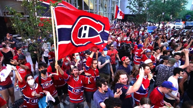 Fans cheering on the home team as the Winnipeg Jets face elimination in game 4 against the Montreal Canadiens in Montreal, Quebec, Monday, June 7, 2021. (Mario Beauregard/CP)