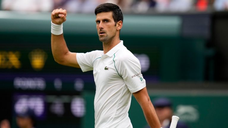 Serbia's Novak Djokovic celebrates a point. (Kirsty Wigglesworth/AP)