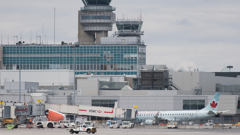 Air Canada planes are shown on the tarmac at Montreal-Pierre Elliott Trudeau International Airport, Saturday, May 16, 2020. (Graham Hughes / CP)