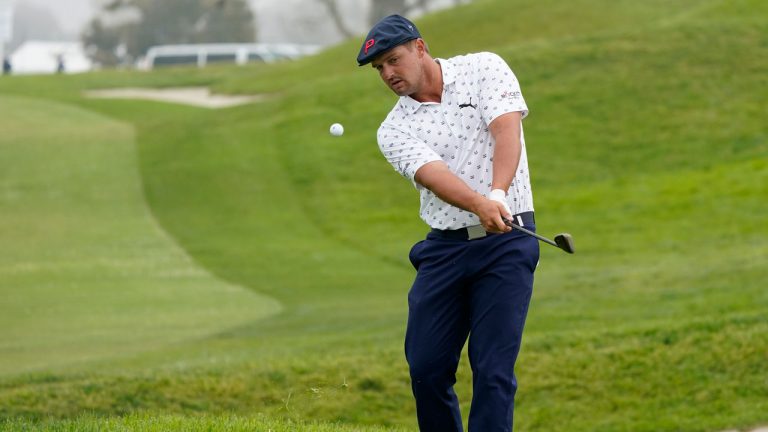 Bryson DeChambeau chips onto the second green during the second round of the U.S. Open Golf Championship. (Marcio Jose Sanchez/AP)