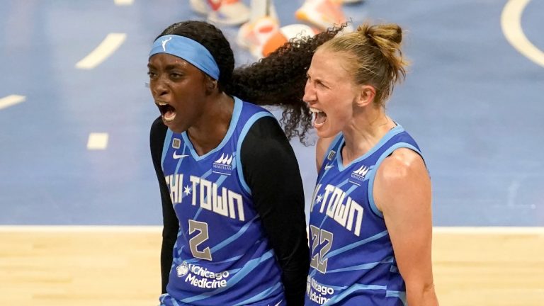 Chicago Sky's Kahleah Copper (2) celebrates with Courtney Vandersloot after Vandersloot was fouled and scored in the act of shooting during the second half of a WNBA basketball game against the Connecticut Sun Thursday, June 17, 2021, in Chicago. The Sky won 81-75. (Charles Rex Arbogast/AP) 