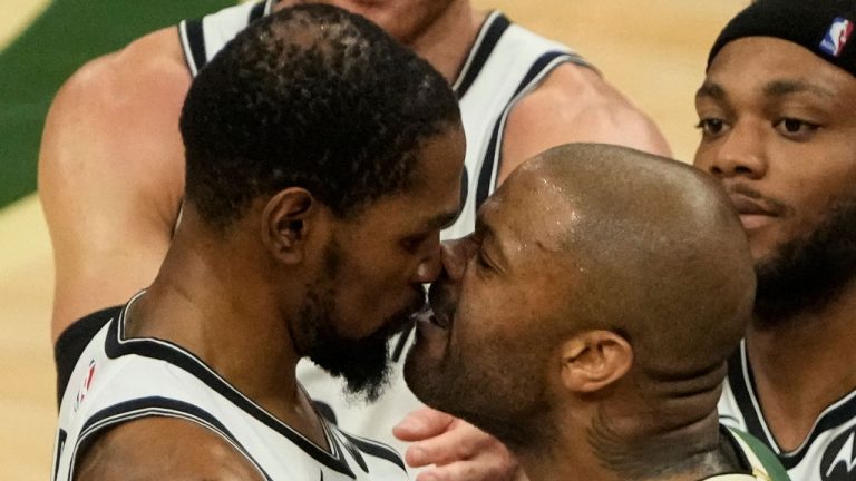 Milwaukee Bucks' P.J. Tucker and Brooklyn Nets' Kevin Durant have words during the second half of Game 3 of the NBA Eastern Conference basketball semifinals game. (Morry Gash/AP) 