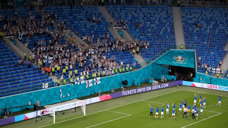 Finland fans applaud fans at the end of the Euro 2020 Group B match between Finland and Belgium at Saint Petersburg Stadium in St. Petersburg, Russia, Monday, June 21, 2021. (Anton Vaganov/Pool Photo via AP) 