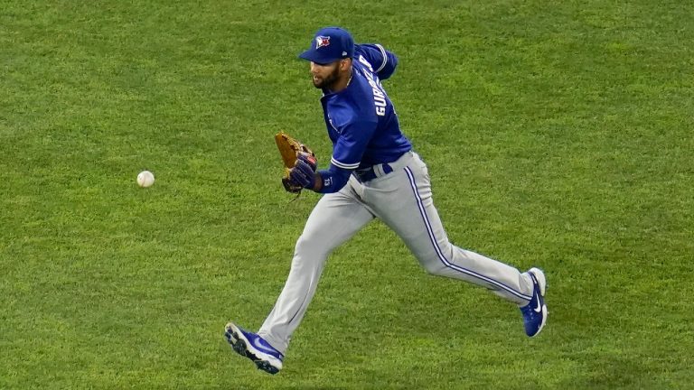 Toronto Blue Jays left fielder Lourdes Gurriel Jr. collects an RBI single by Baltimore Orioles' Austin Hays during the fifth inning of a baseball game, Friday, June 18, 2021, in Baltimore. Orioles' Pat Valaika scored on the hit. (Julio Cortez/AP)