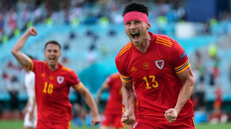 Wales' Kieffer Moore celebrates after scoring his side's opening goal during the Euro 2020 group A match between Wales and Switzerland, at the Baku Olympic stadium, in Baku, Azerbaijan, Saturday, June 12, 2021. (Darko Vojinovic/AP) 