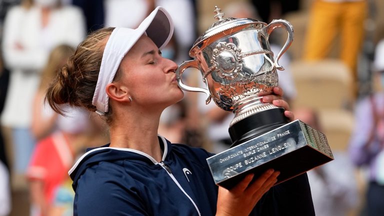Czech Republic's Barbora Krejcikova kisses the cup after defeating Russia's Anastasia Pavlyuchenkova in their final match of the French Open at the Roland Garros stadium Saturday, June 12, 2021 in Paris. (Michel Euler/AP)