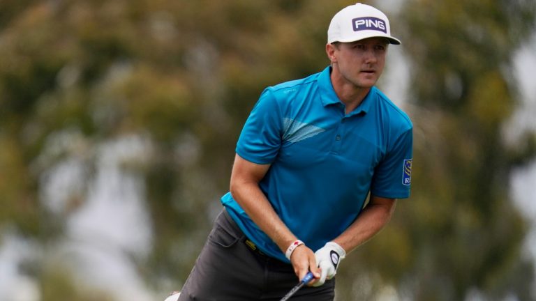 Mackenzie Hughes, of Canada, watches plays his shot from the second tee during the final round of the U.S. Open Golf Championship, Sunday, June 20, 2021, at Torrey Pines Golf Course in San Diego. (Gregory Bull/AP) 