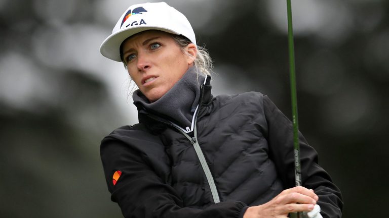 Mel Reid, of England, plays her shot from the 10th tee during the first round of the U.S. Women's Open golf tournament. (Jed Jacobsohn/AP) 