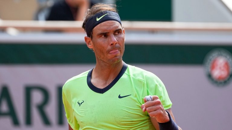 Spain's Rafael Nadal clenches his fist as he plays Argentina's Diego Schwartzman during their quarterfinal match of the French Open tennis tournament at the Roland Garros stadium Wednesday, June 9, 2021 in Paris. (Michel Euler/AP) 