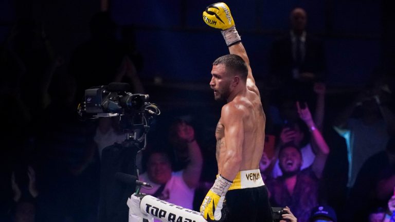 Vasiliy Lomachenko, of Ukraine, celebrates after defeating Masayoshi Nakatani, of Japan, by technical knockout during a lightweight bout Saturday, June 26, 2021, in Las Vegas. (John Locher/AP) 
