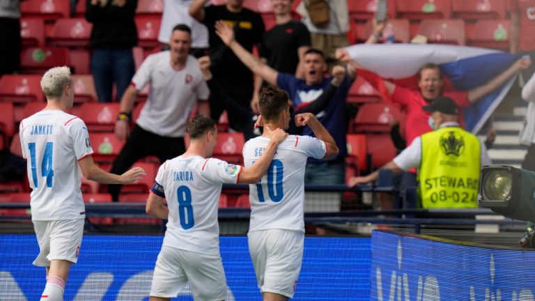 Czech Republic's Patrik Schick, right, celebrates with teammates after scoring his side's opening goal from penalty during the Euro 2020 group D match between Croatia and Czech Republic at the Hampden Park Stadium in Glasgow, Friday, June 18, 2021. (Petr David Josek/AP) 