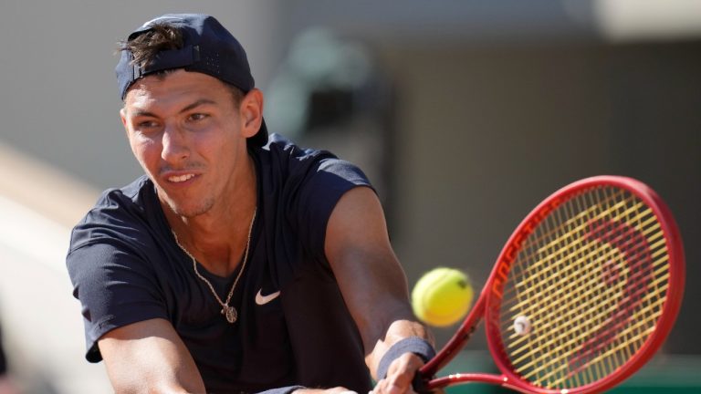 Australia's Alexei Popyrin plays a return to Spain's Rafael Nadal during their first round match on day three of the French Open tennis tournament at Roland Garros in Paris, France, Tuesday, June 1, 2021. (Christophe Ena/AP)