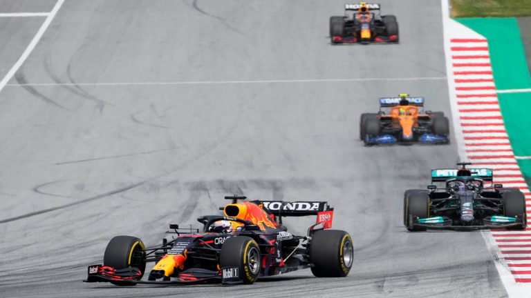 Red Bull driver Max Verstappen, left, of the Netherlands leads ahead of Mercedes driver Lewis Hamilton of Britain, right, during the Styrian Formula One Grand Prix at the Red Bull Ring racetrack. (Darko Vojinovic/AP) 